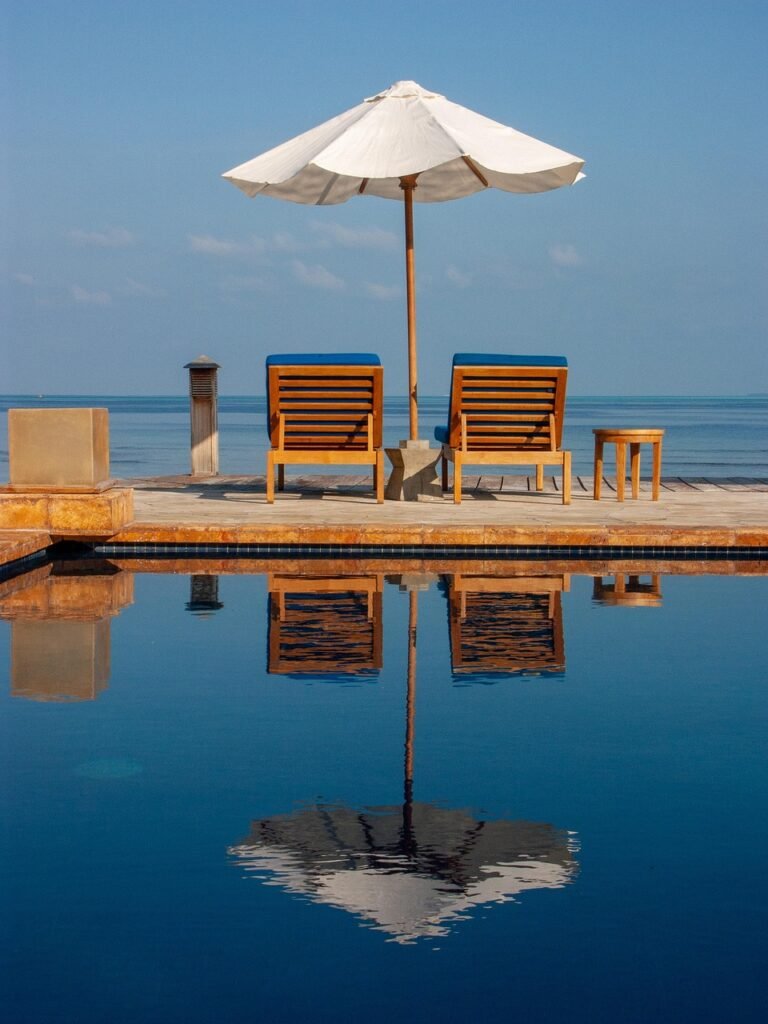 g849860807bcab6261f6834624301e41519a5fb72914ac8a02c981ed0fcd39883e581981d7a54c02f238685713505ea157f62ae73ab90dcd3d4acbdba1f4b5e22 1280 6613331 deck chairs, parasol, vacation, nature, ocean, maldives, beach resort