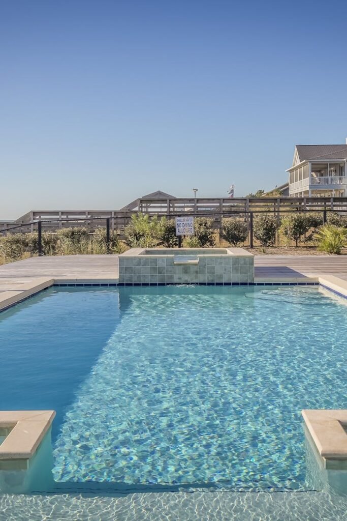 pexels photo 261327 261327 1 Stunning infinity pool at a seaside resort, perfect for relaxation and leisure travel.
